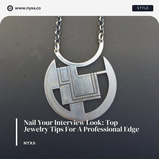 Helios Sterling Silver Necklace draped over a jewelry stand, illustrating its refined design perfect for business attire.
