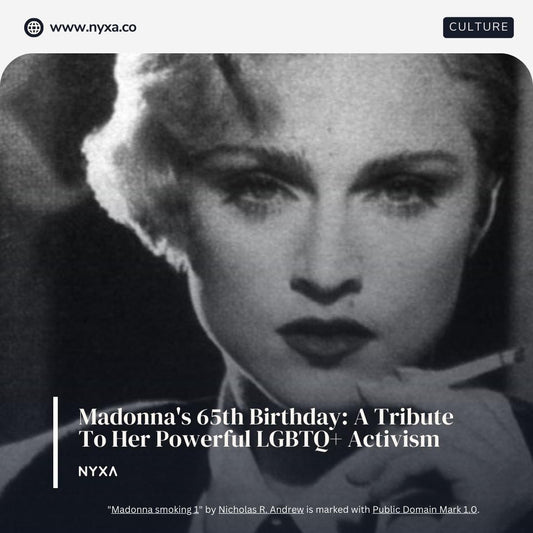 A black and white photograph of the pop icon Madonna smoking a cigarette