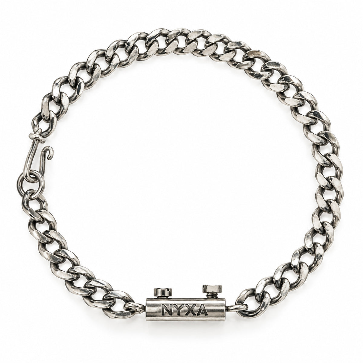 Tekton sterling silver bracelet arranged in a circle, showing polished curb links and its cylindrical NYXA centerpiece.